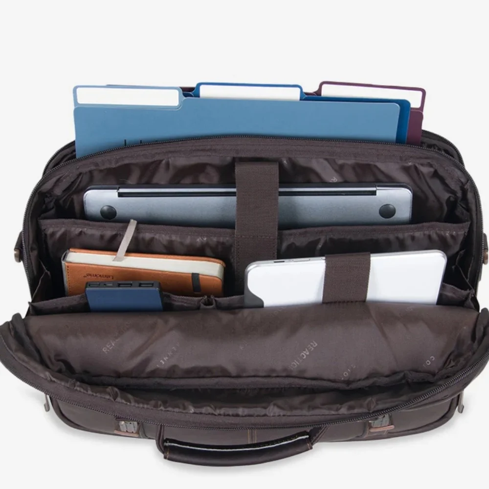 Kenneth Cole Reaction brown Colombian leather flapover messenger bag.